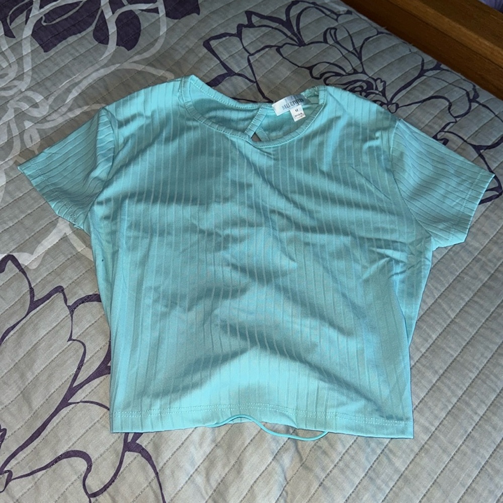 Medium teal shirt with open back with straps